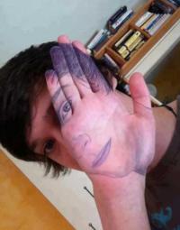 Optical illusion hand-face painting trick shot