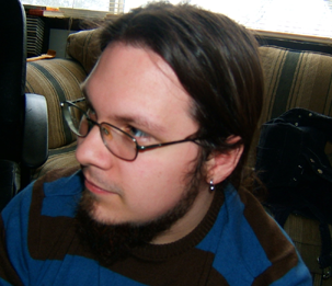 Member profile photo with glasses and beard