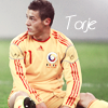 Soccer player avatar, kneeling on the pitch