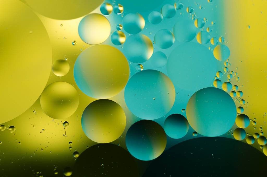 Macro bubbles in teal and yellow abstract swirl