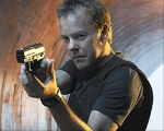 Jack Bauer with his signature phone gadget