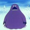 Moomin character standing in a snowy landscape